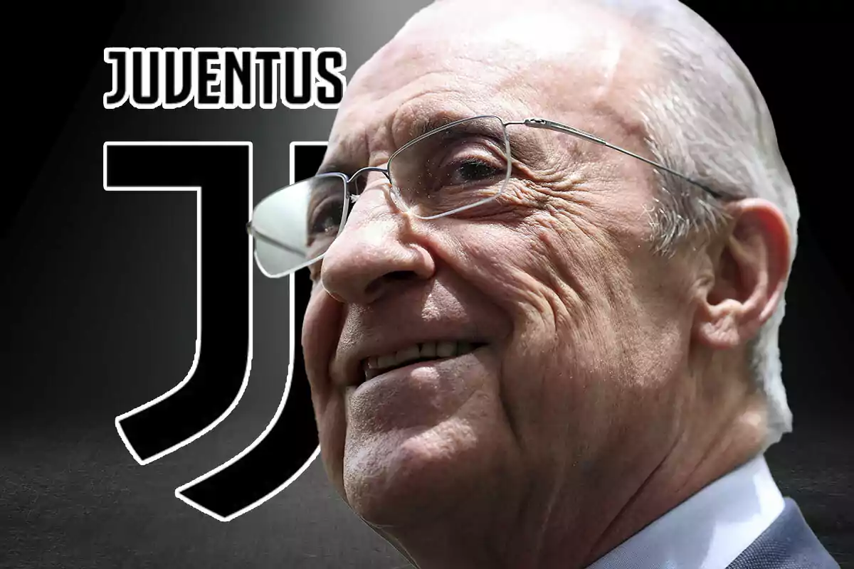 Older man with glasses smiles in front of the Juventus club logo and name on a dark background