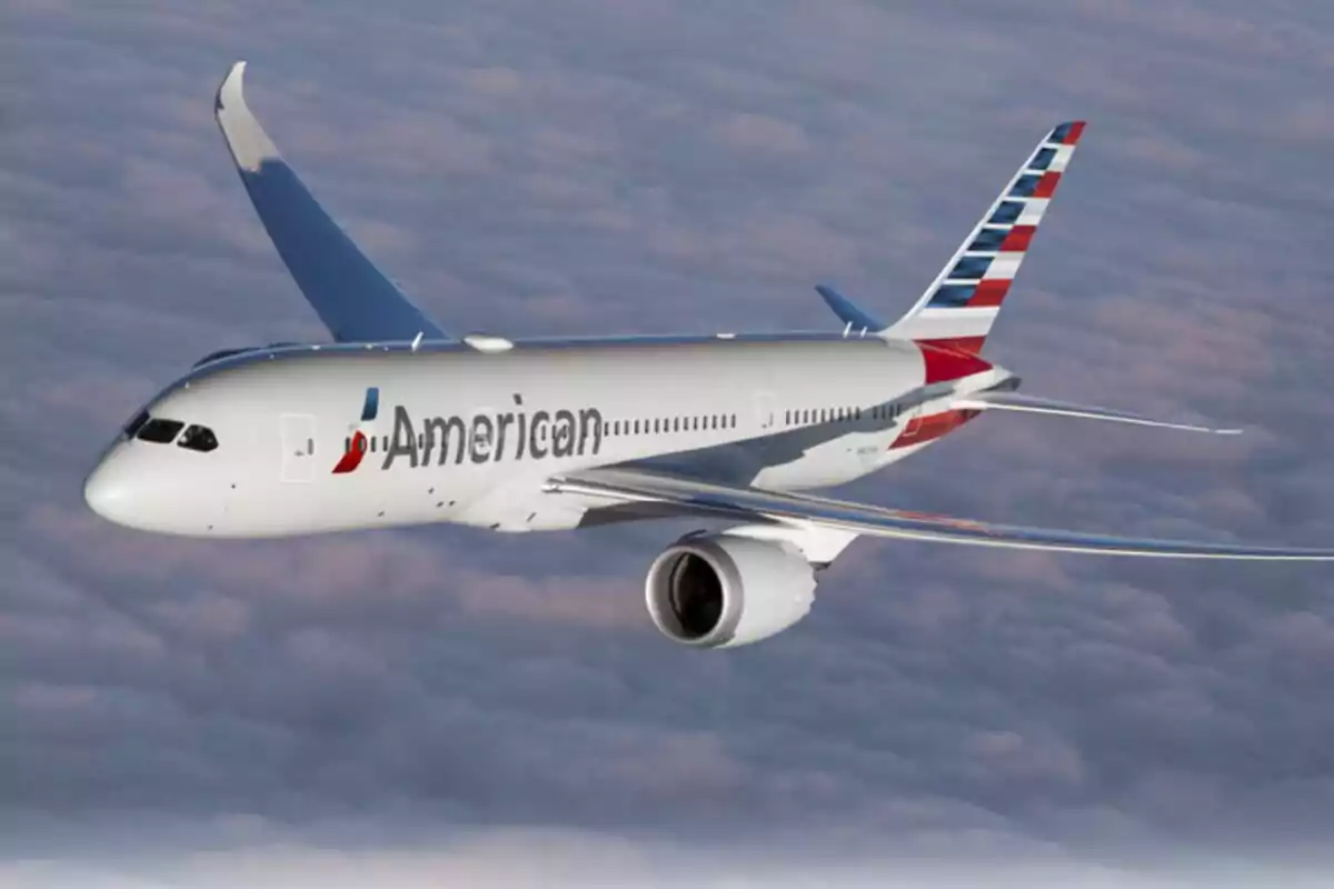 American Airlines plane flying over a sea of clouds American Airlines plane flying over a sea of clouds