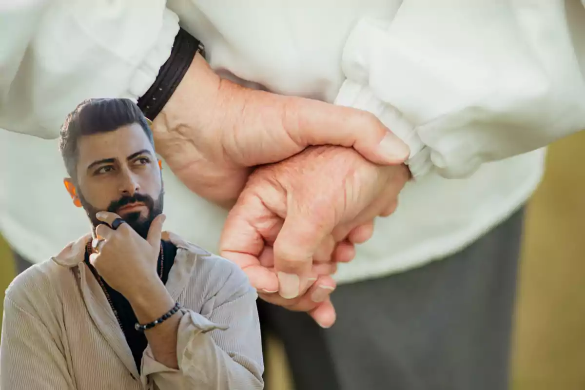 Hombre pensativo en primer plano y manos de una persona mayor entrelazadas en el fondo Hombre pensativo en primer plano y manos de una persona mayor entrelazadas en el fondo