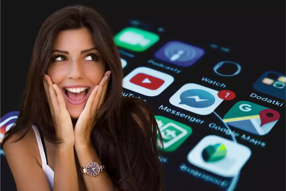 Smiling young woman with a surprised expression in front of a blurred mobile app screen