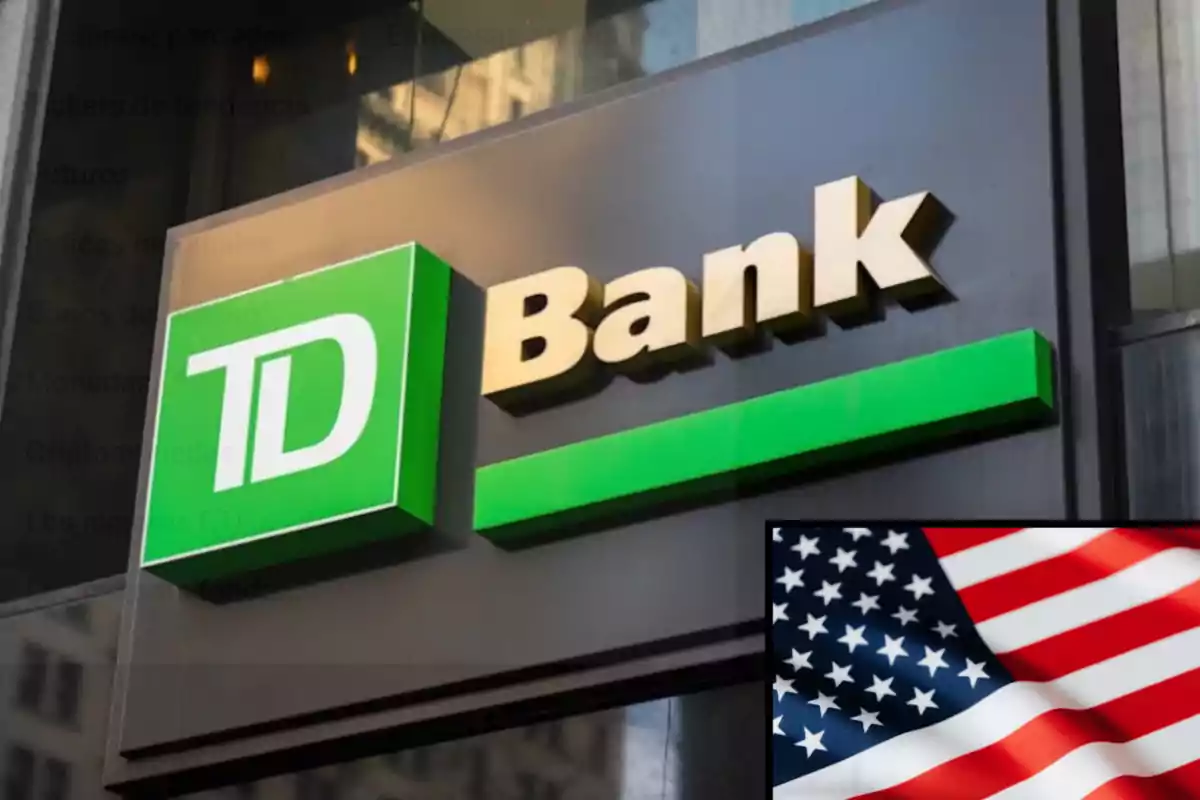 Fachada de una sucursal de TD Bank con un recuadro de la bandera de Estados Unidos en la esquina inferior derecha