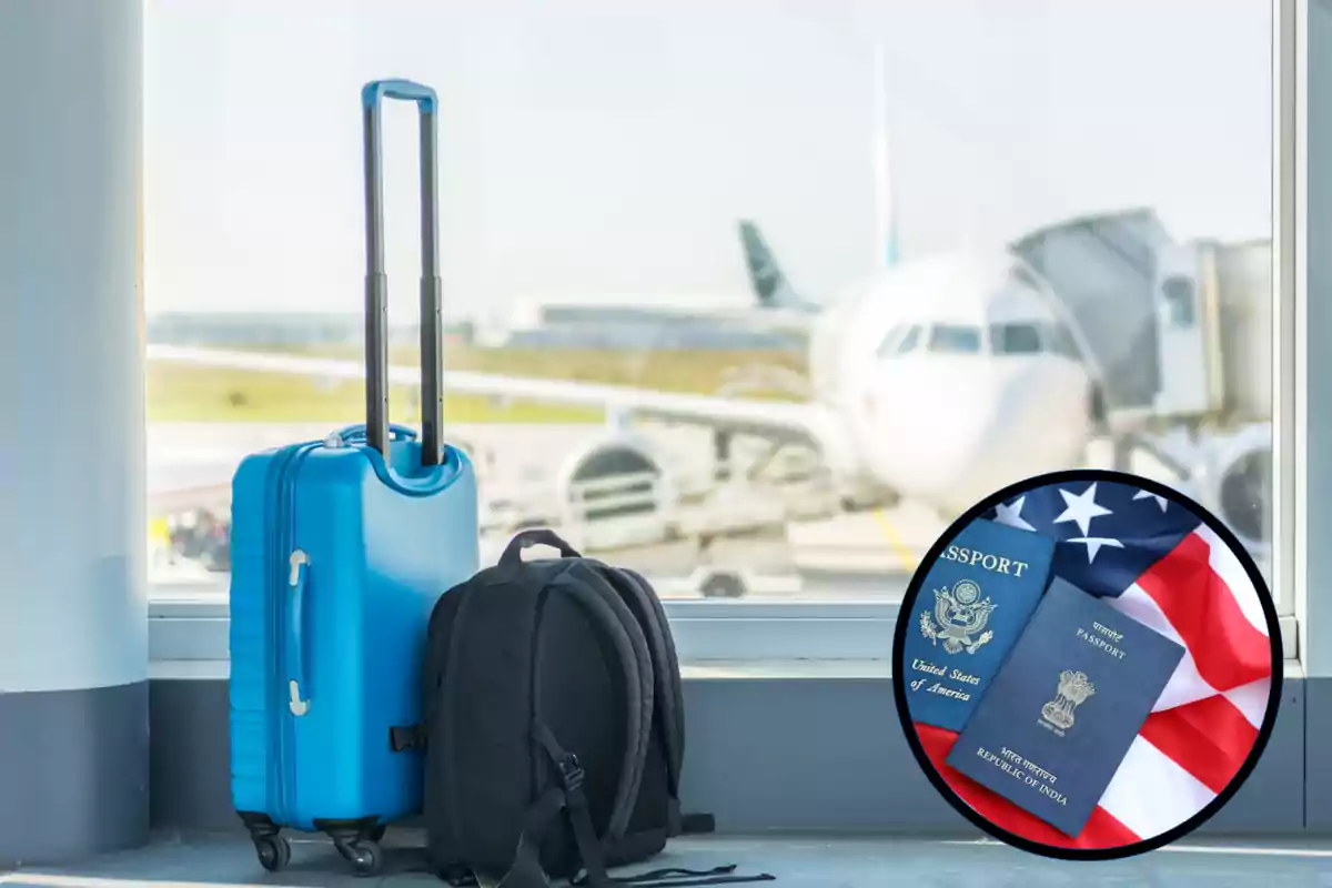Blue suitcase and black backpack next to a window at an airport with a plane in the background and an inset showing two passports on top of a United States flag