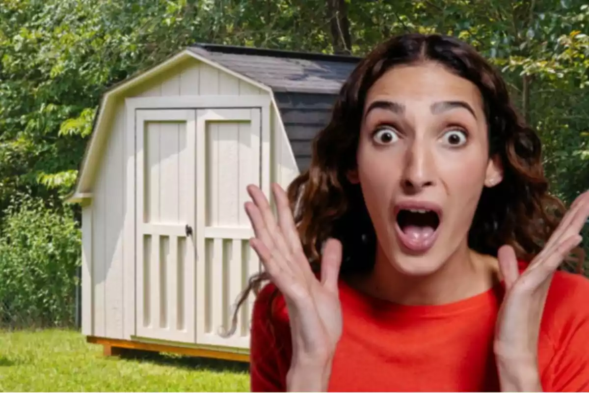 Woman with a surprised expression in front of a white shed in a garden Woman with a surprised expression in front of a white shed in a garden