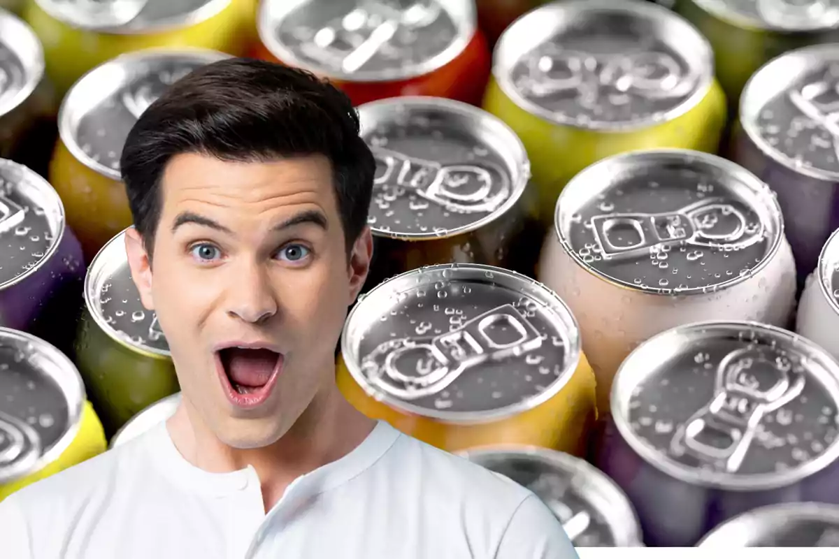 Surprised man in front of several beverage cans with water droplets