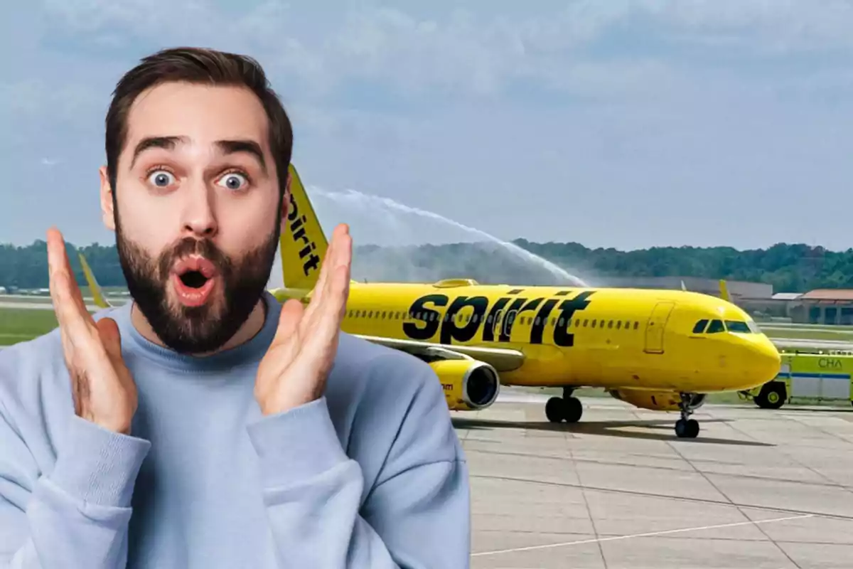 Man with a surprised expression in front of a yellow Spirit Airlines plane on an airport runway
