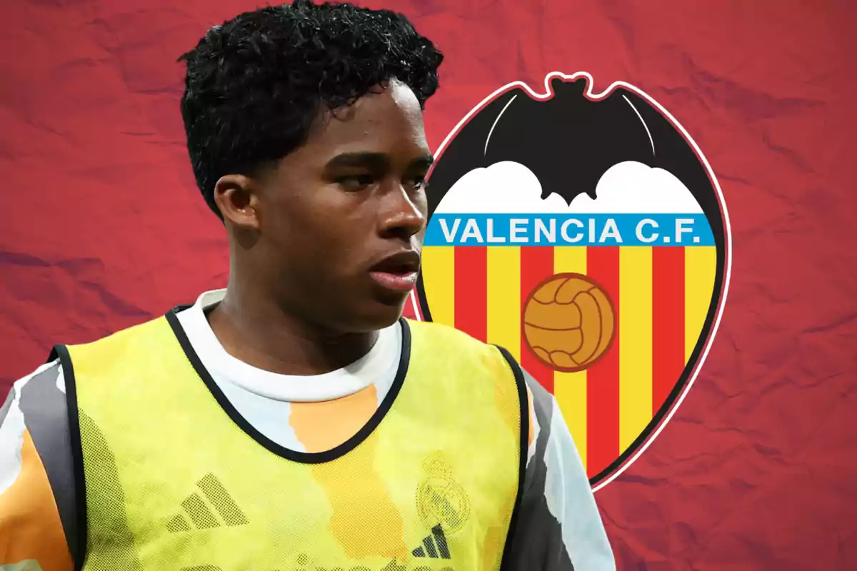 A player wearing a training bib appears in the foreground with the Valencia CF crest in the background on a red wall.