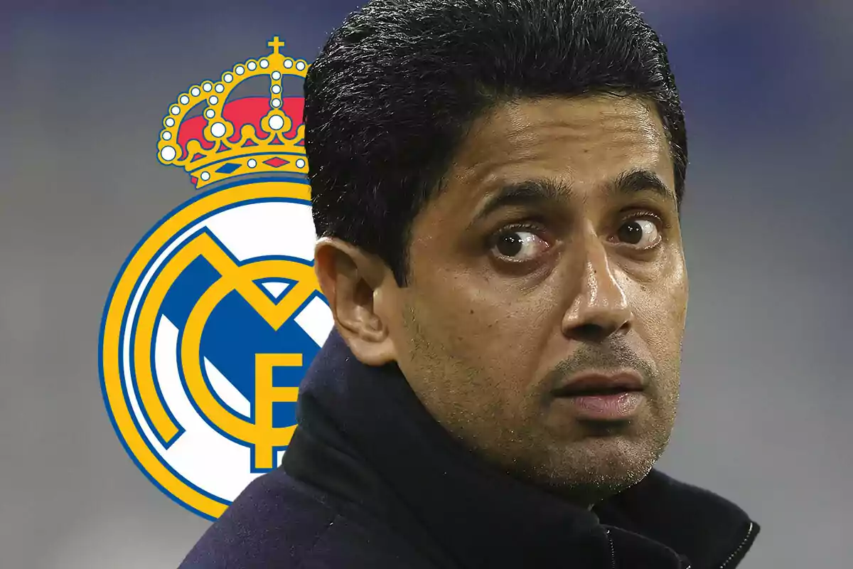 Nasser Al-Khelaifi con expresión seria frente al escudo del Real Madrid.