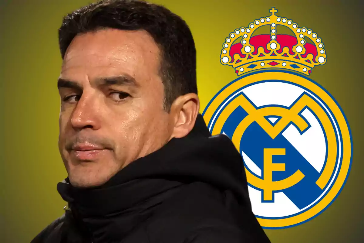 A man in a black jacket looks to the side with the Real Madrid crest in the background.