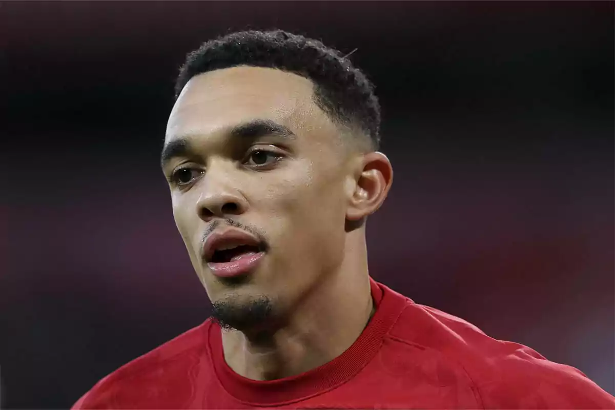 Trent Alexander-Arnold in a red jersey on the field.