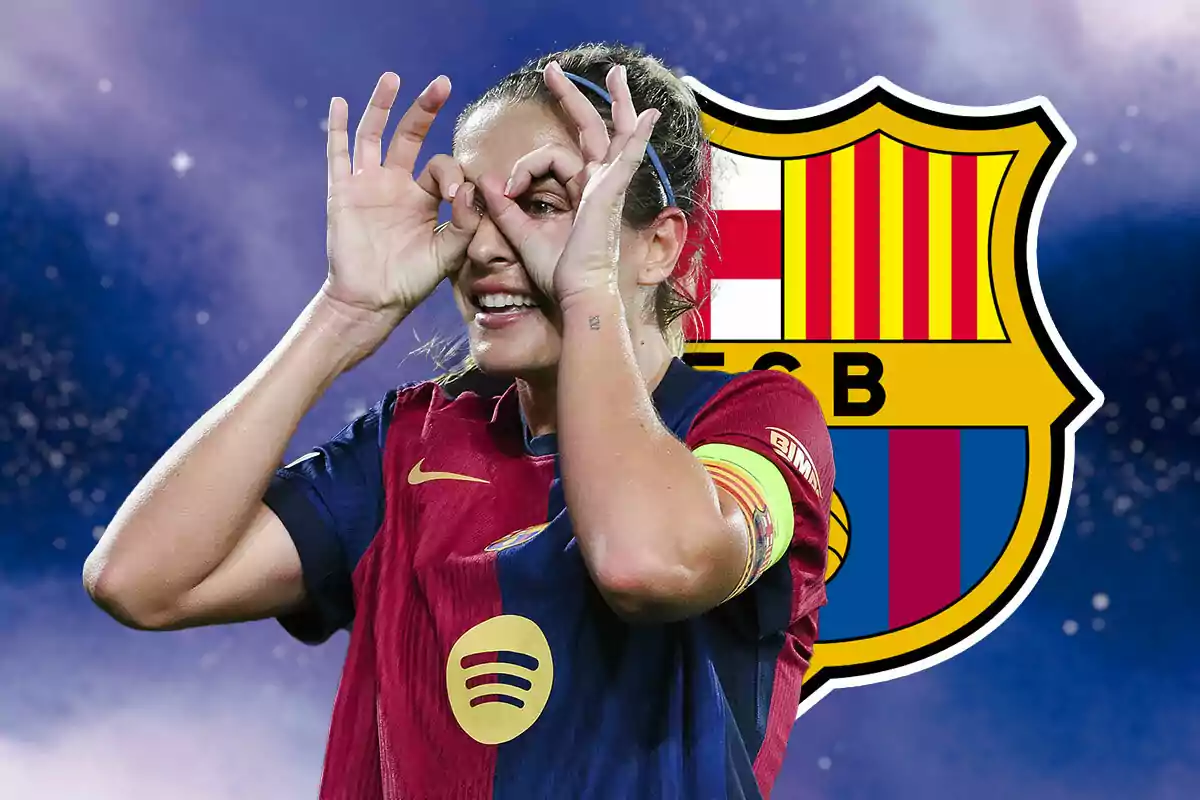 Female soccer player wearing a FC Barcelona uniform making a gesture with her hands in front of the team's crest.