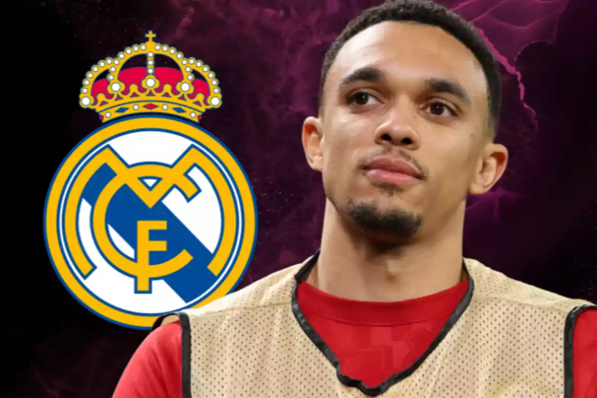 A man in a red jersey and beige vest in front of the Real Madrid logo on a dark background.