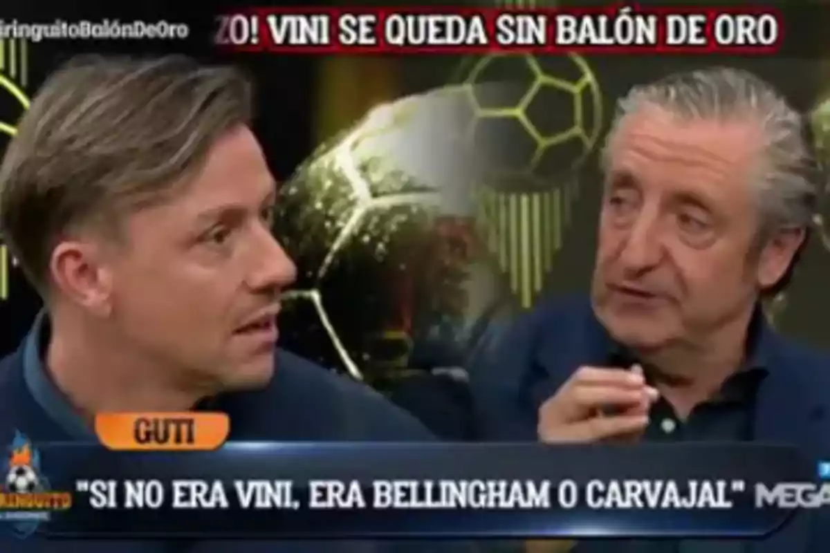 Two people talking on a TV show with a graphic in the background mentioning Vini and the Ballon d'Or.