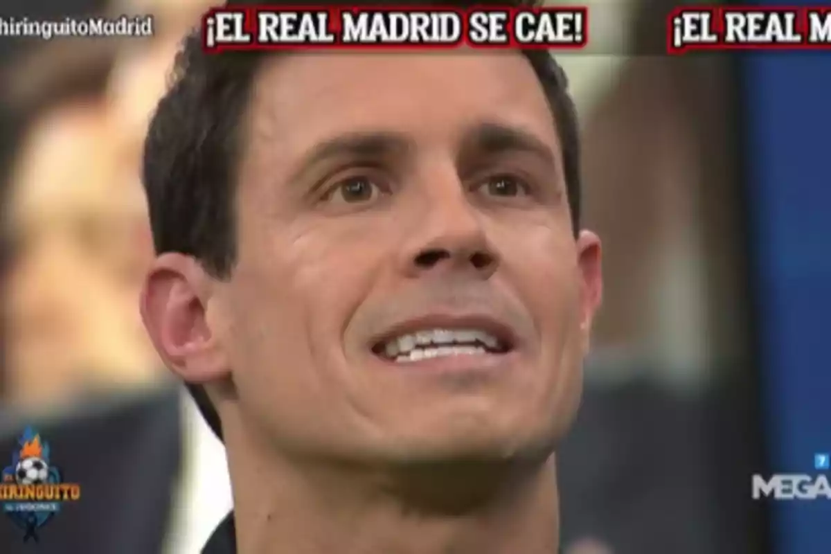 A man with a serious expression appears on a television program with the text "Real Madrid is falling!" at the top.