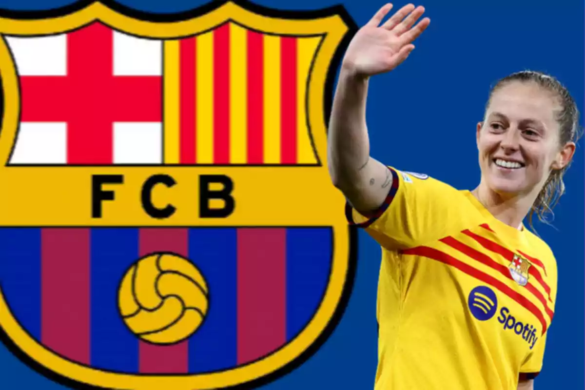 FC Barcelona soccer player waving in front of the club's crest.