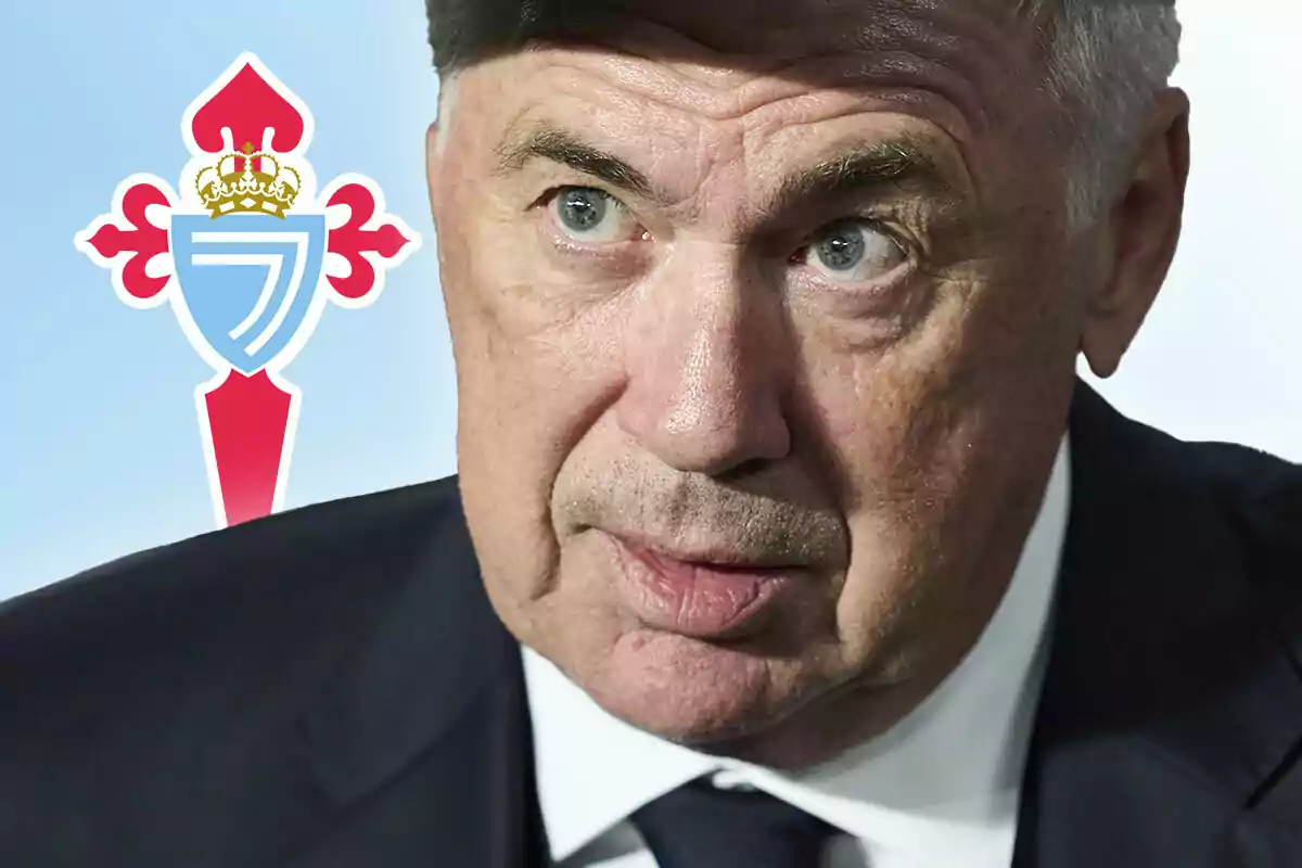 Carlo Ancelotti con expresión seria y el escudo del Celta de Vigo en el fondo.