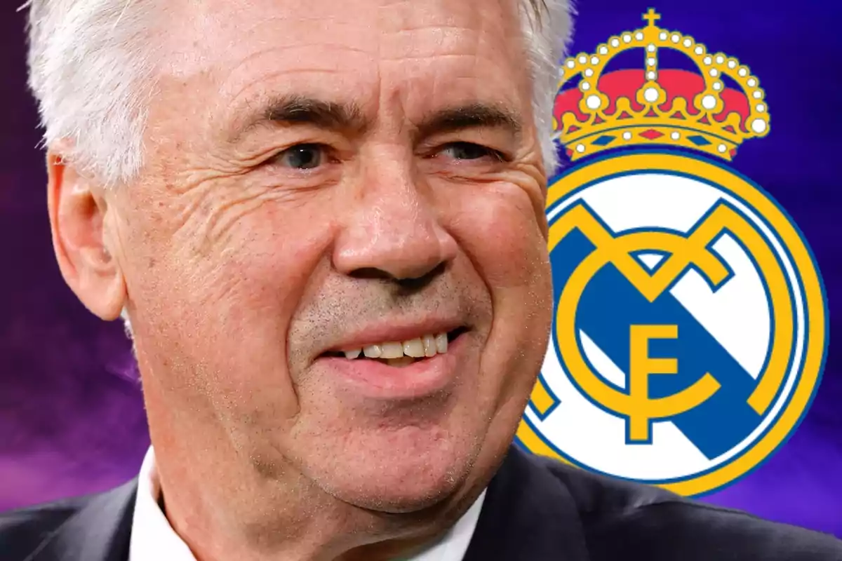 Hombre sonriendo con el logo del Real Madrid de fondo.