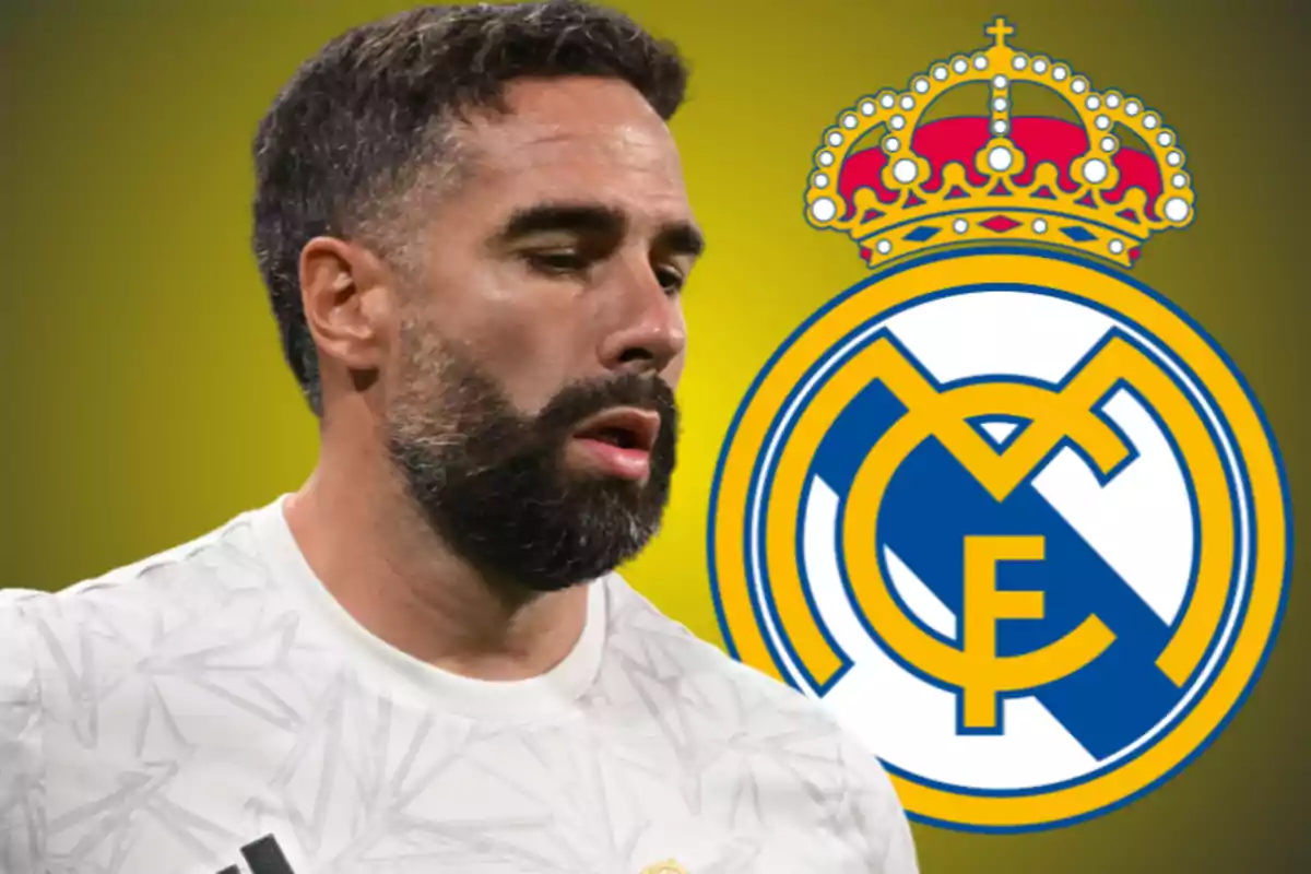 A player with a beard and a white jersey in front of the Real Madrid crest on a yellow background.