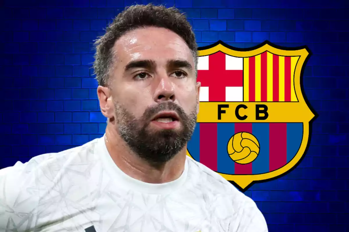 Un jugador de fútbol con barba y cabello oscuro frente al escudo del FC Barcelona sobre un fondo azul.