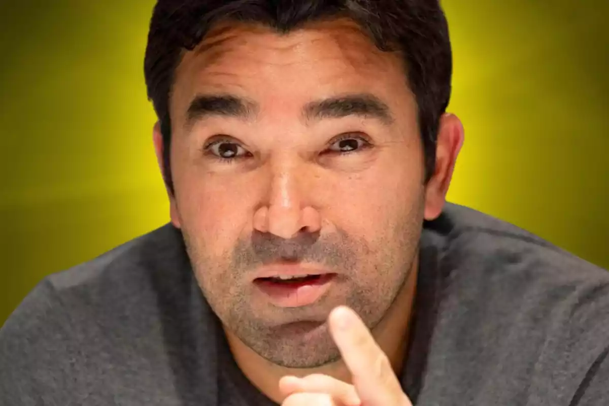 Deco looks ahead and points his finger on a yellow background