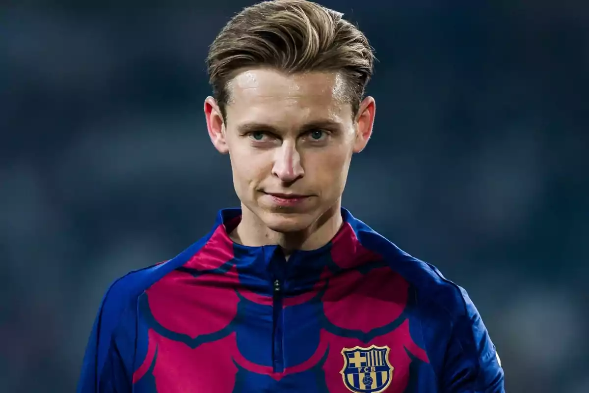 A soccer player in the FC Barcelona uniform.