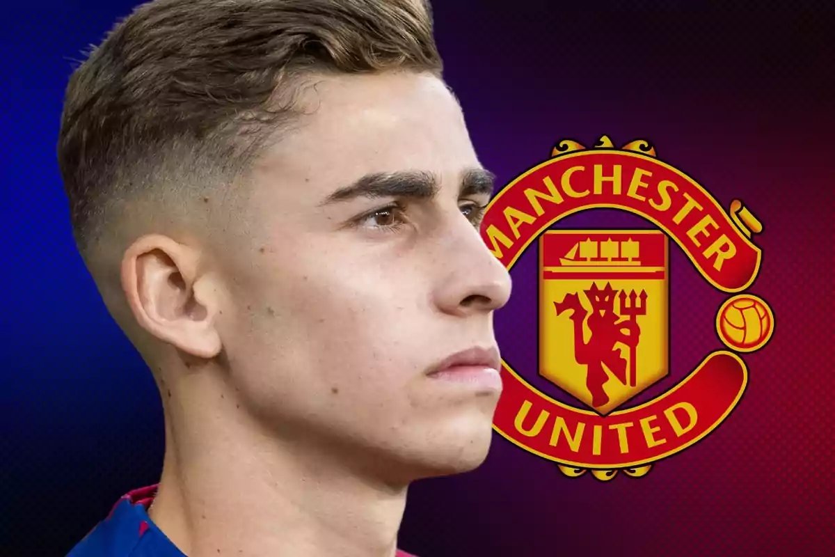 A young man in a blue and red shirt in profile in front of the Manchester United logo.