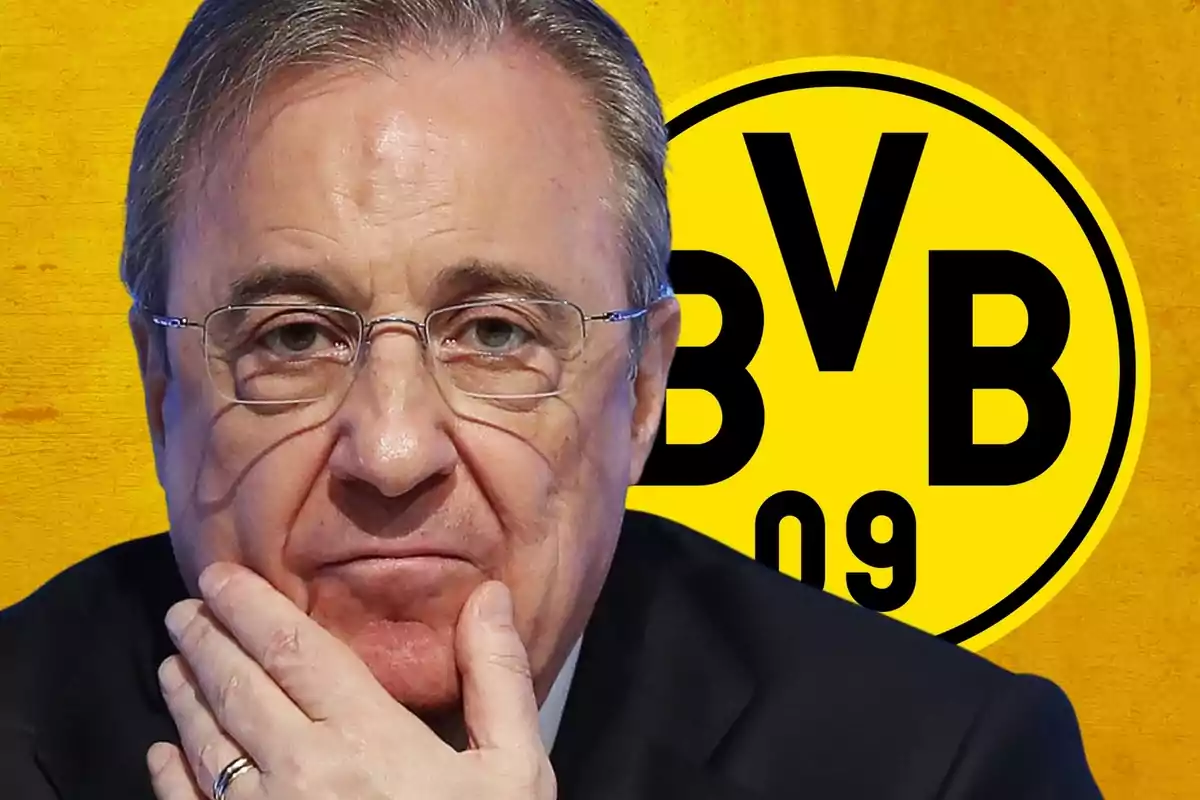 Man with glasses and thoughtful expression in front of the Borussia Dortmund logo.