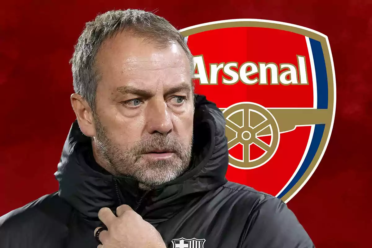 A man in a dark jacket in front of the Arsenal logo on a red background.