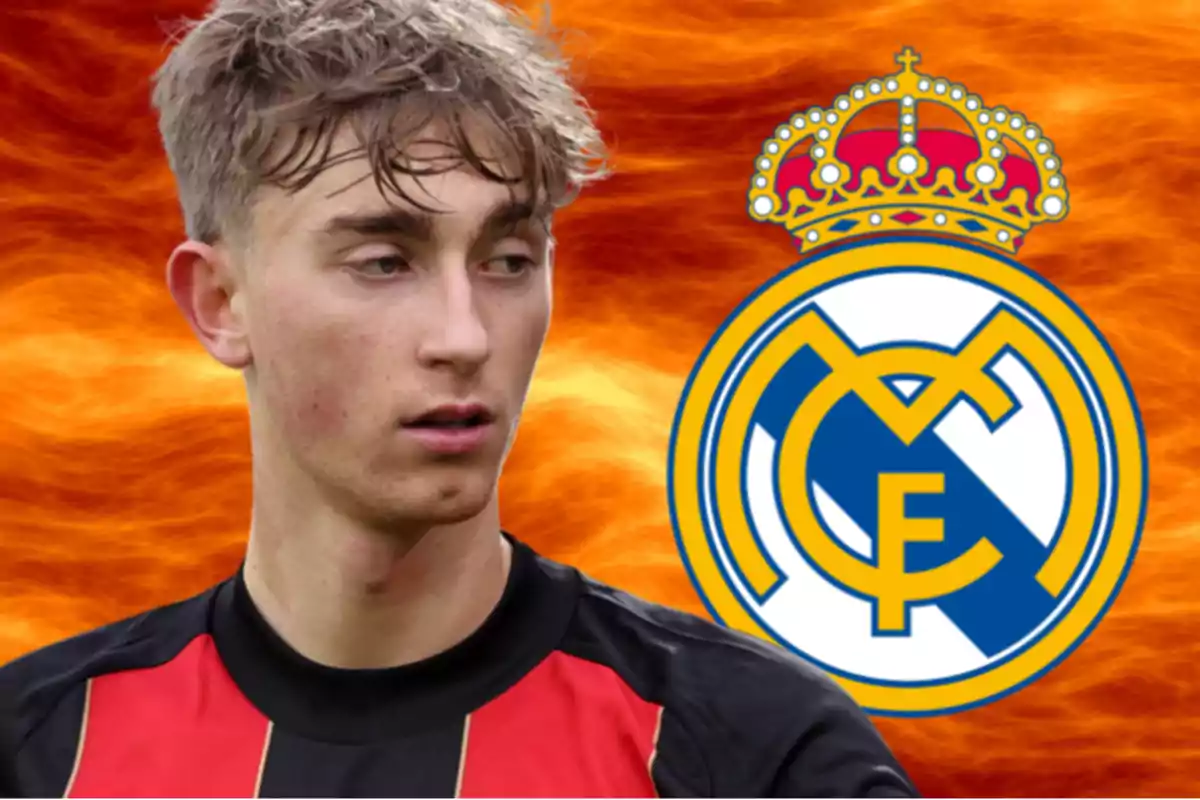 A player in a red and black jersey in front of a background with the Real Madrid crest.