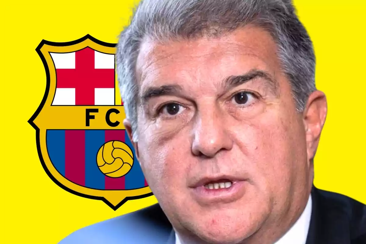 A man in front of the FC Barcelona crest with a yellow background.