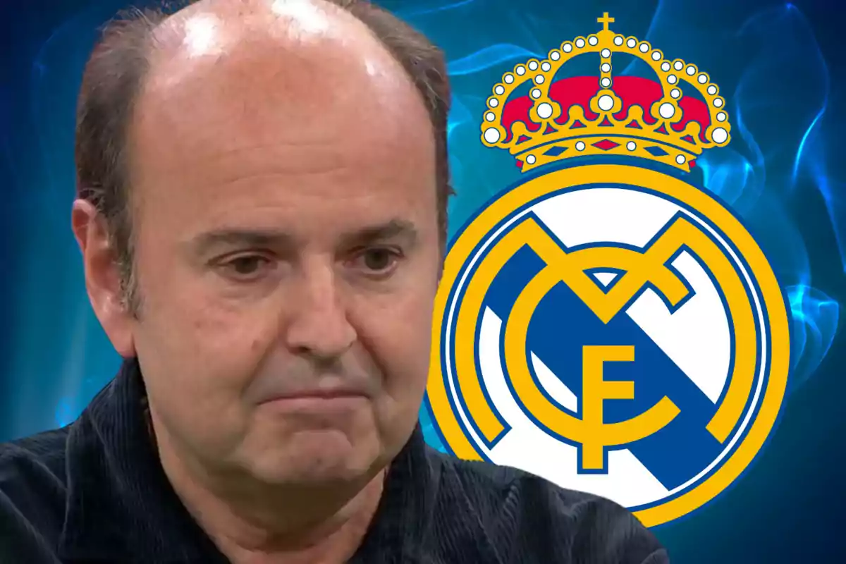 A man with a serious expression in front of the Real Madrid crest on a blue background.