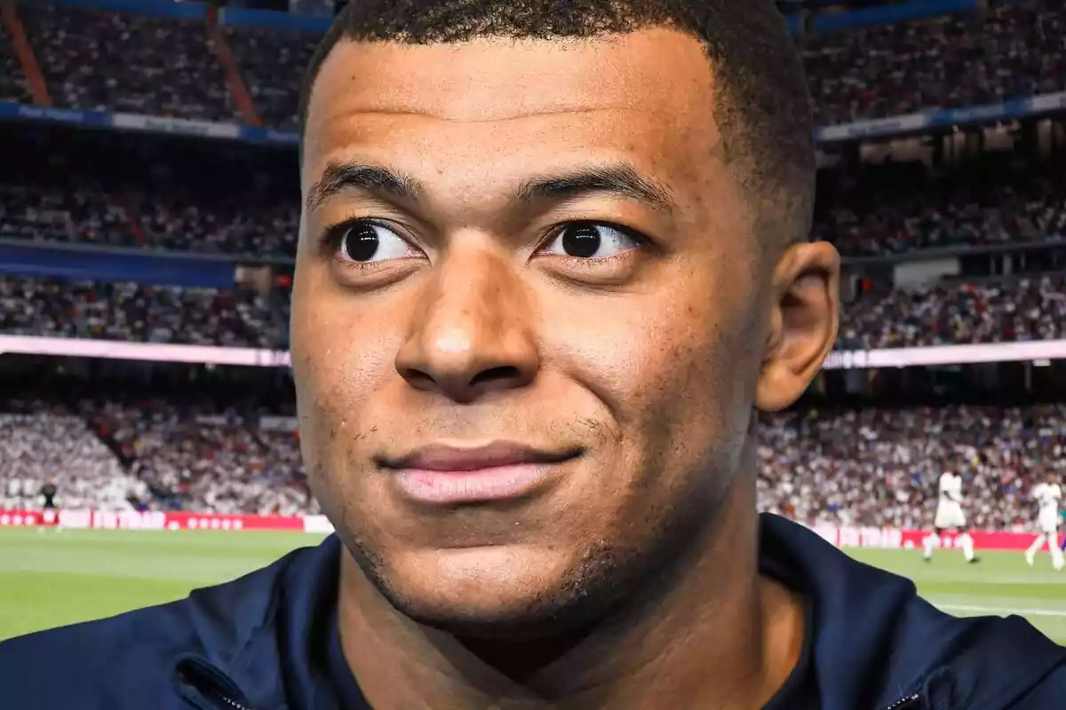 Kylian Mbappé in the foreground with the Santiago Bernabéu Stadium in the background