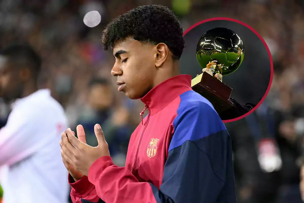 Lamine Yamal con uniforme del FC Barcelona está con los ojos cerrados y las manos juntas, mientras en un círculo al fondo se muestra un trofeo Golden Boy.