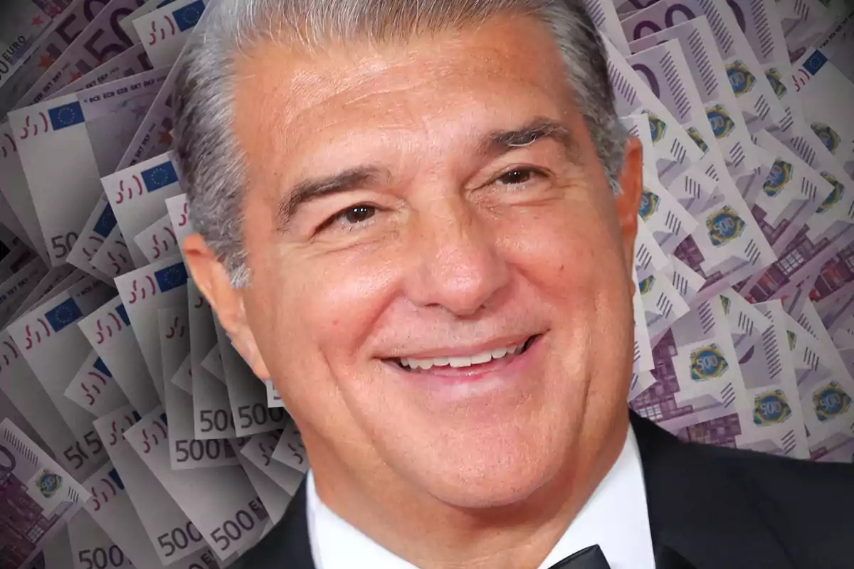 A smiling man with gray hair and a background of 500 euro bills.