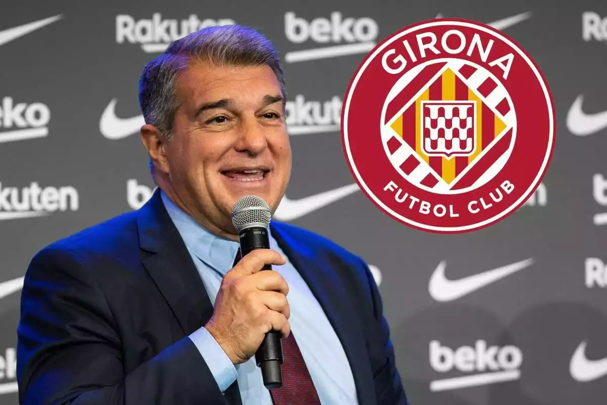 Joan Laporta next to the Girona FC shield