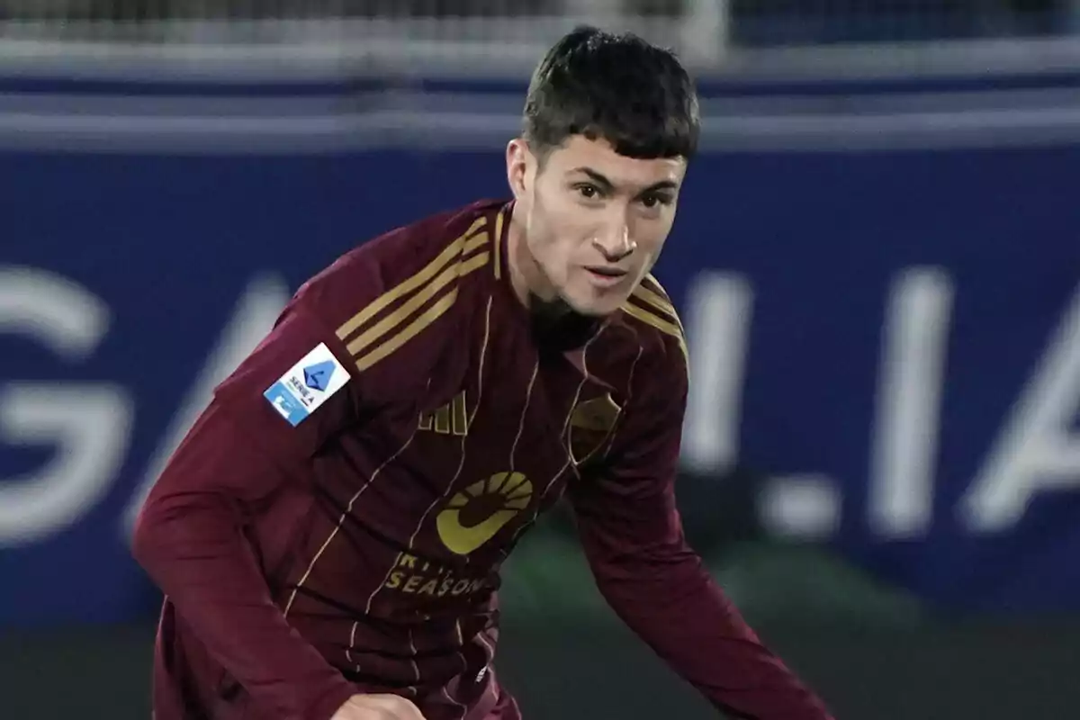 A player in a dark red uniform on the field.