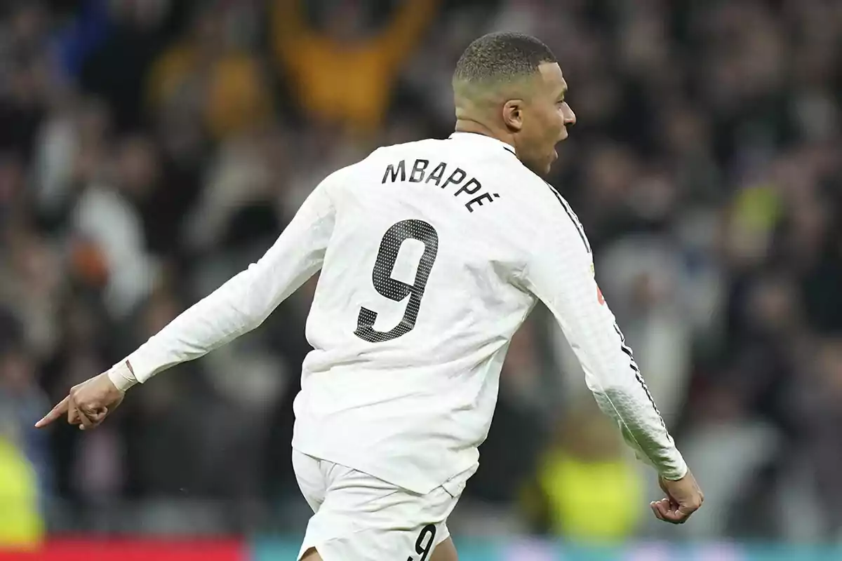 A player celebrating on the field with the number 9 jersey.