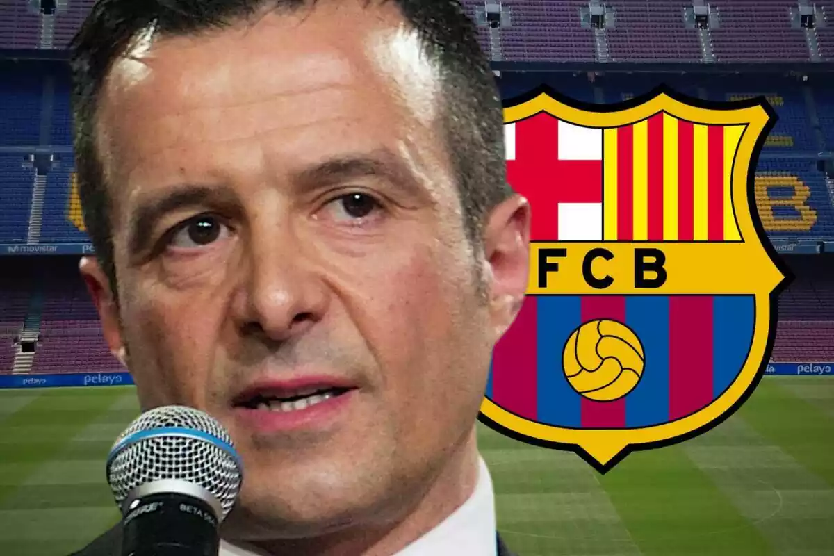 Jorge Mendes speaking into a microphone with the FC Barcelona shield at his side