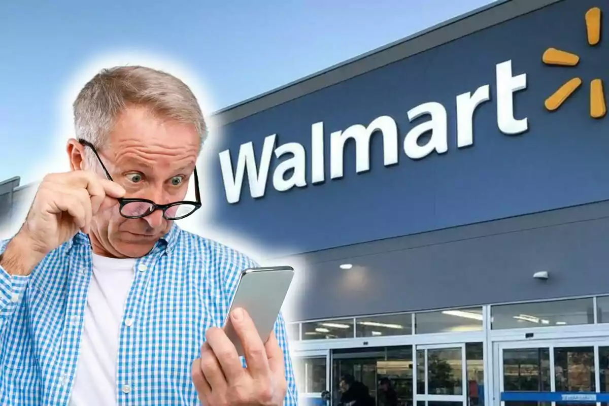 Un hombre con expresión de sorpresa mira su teléfono frente a una tienda de Walmart. Un hombre con expresión de sorpresa mira su teléfono frente a una tienda de Walmart.