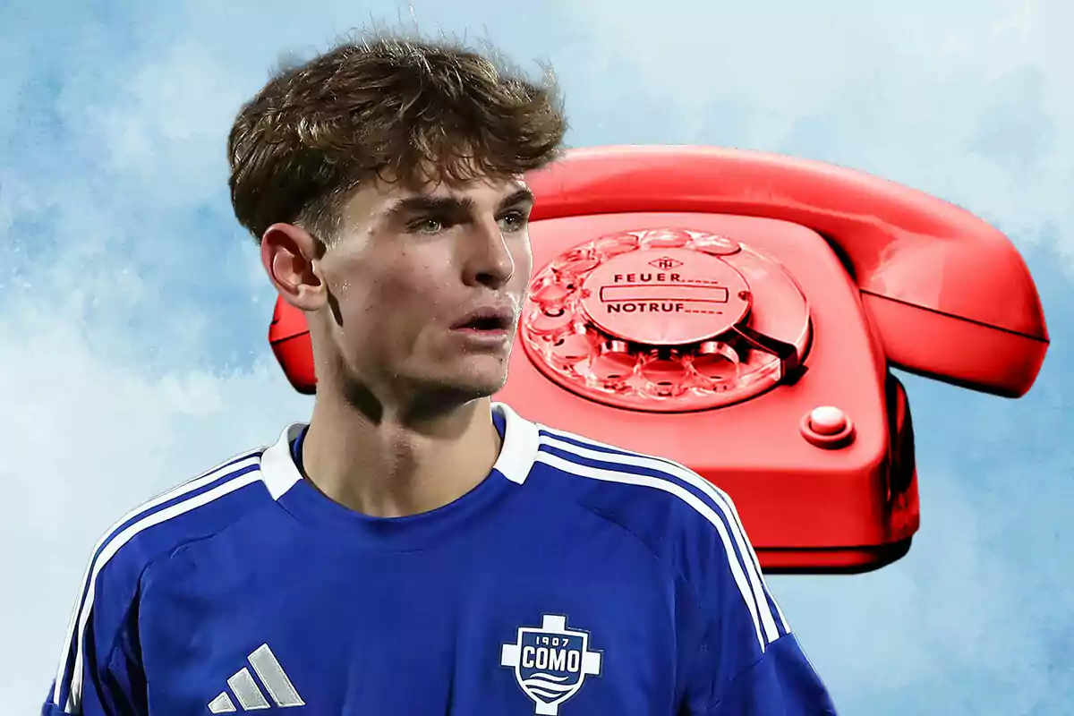 Nico Paz in a blue jersey stands in front of an old red telephone on a light blue background.