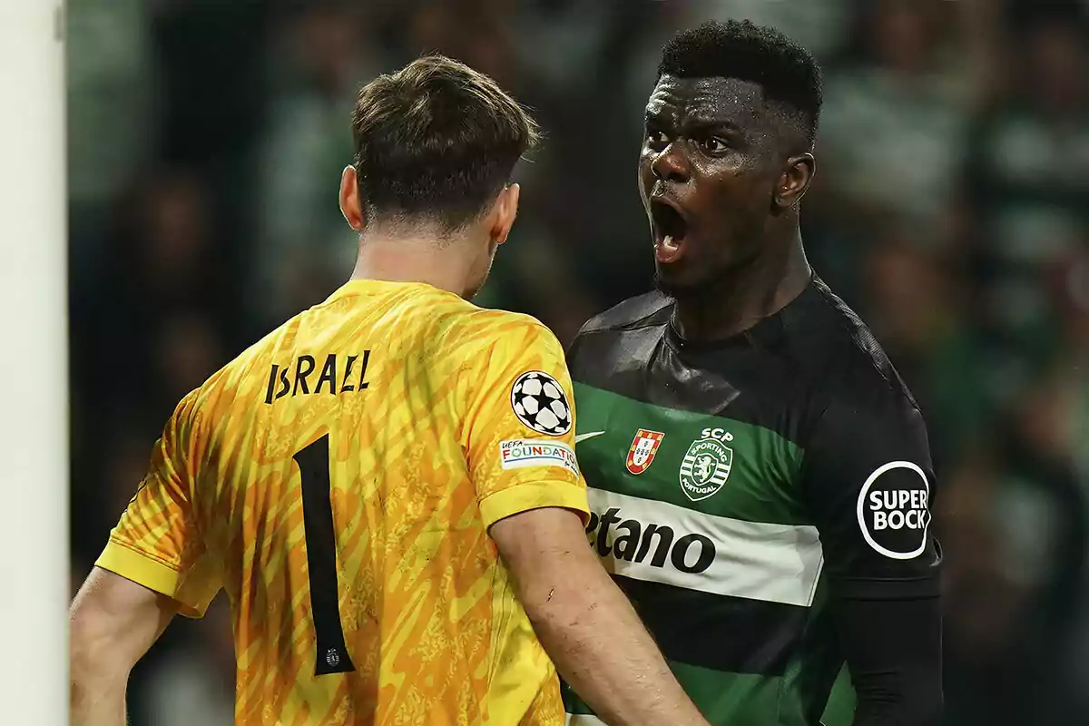 Two players in an intense confrontation during a match, one of them wearing a yellow uniform and the other a green and black uniform. Two players in an intense confrontation during a match, one of them wearing a yellow uniform and the other a green and black uniform.