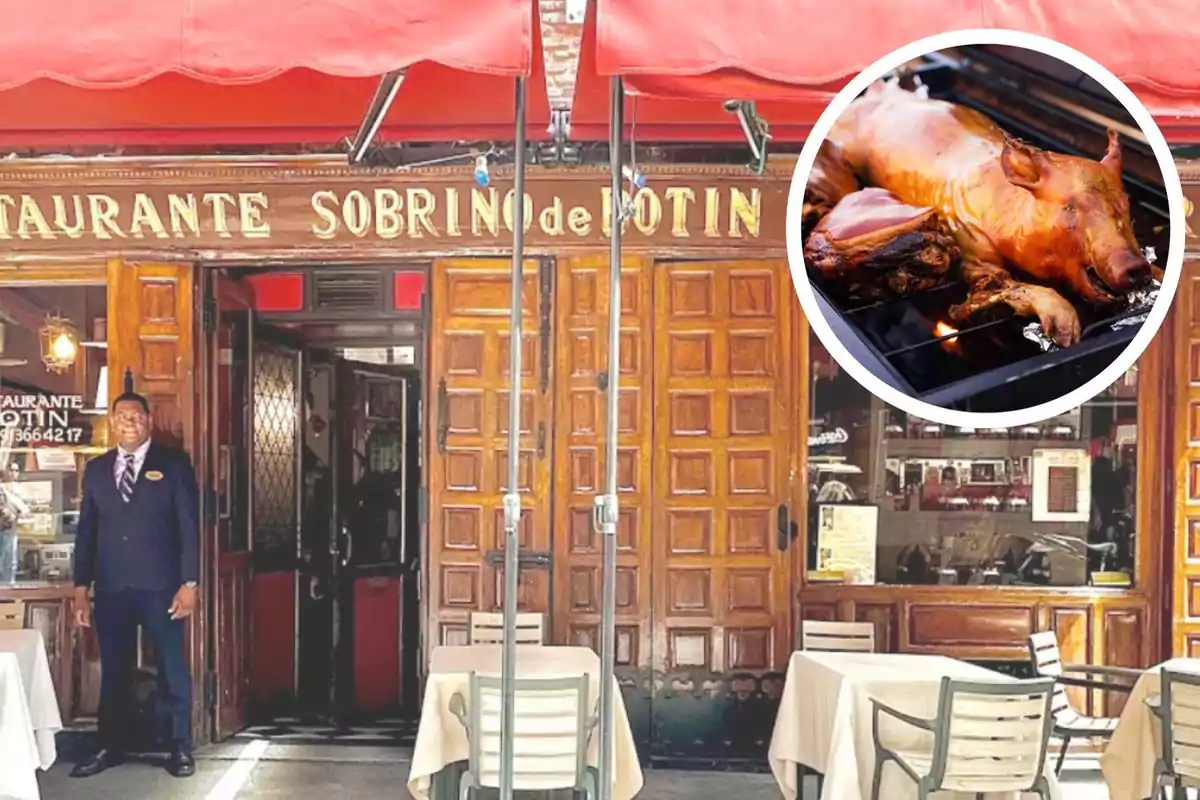 Entrada de un restaurante con un letrero que dice "Restaurante Sobrino de Botín" y un hombre de pie en la puerta, con una imagen circular de un cochinillo asado en la esquina superior derecha.