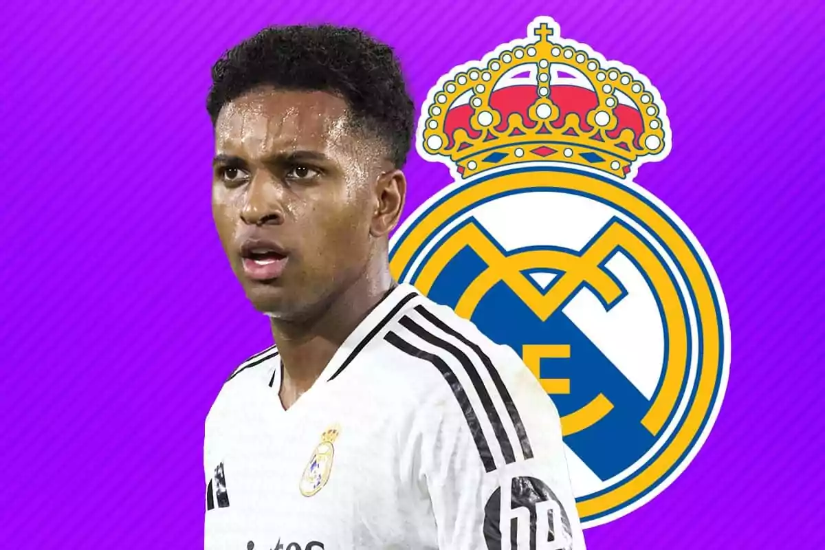 Rodrygo con la camiseta del Real Madrid frente al escudo del equipo.