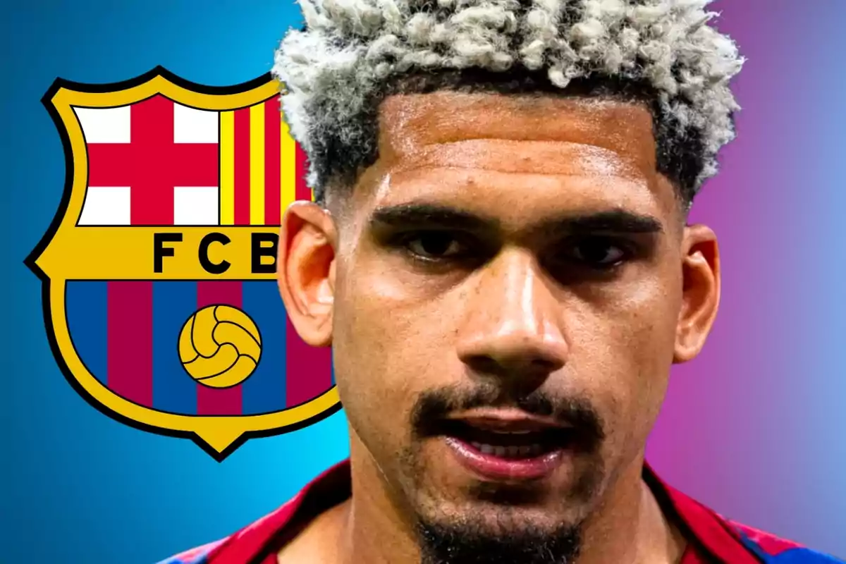 A soccer player with the FC Barcelona crest in the background. A soccer player with the FC Barcelona crest in the background.